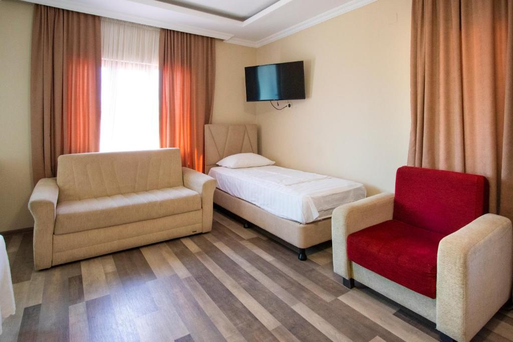 Postel nebo postele na pokoji v ubytování Hotel Smile