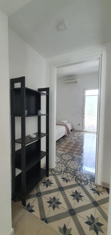 Letto o letti in una camera di All'ombra dell'ulivo