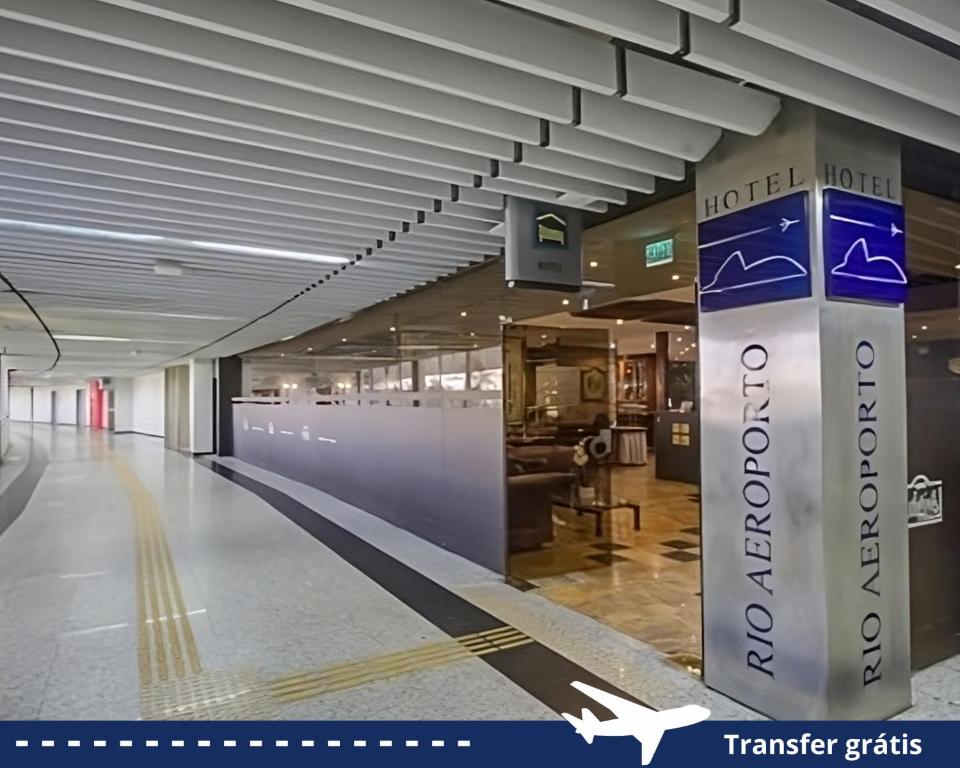 an empty building with a sign in the middle at Rio Aeroporto Hotel Galeão in Rio de Janeiro