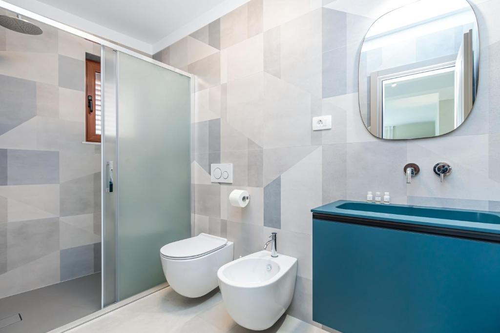Ванная комната в Contrada del Nonno Apartments (city center - private parking on-site)