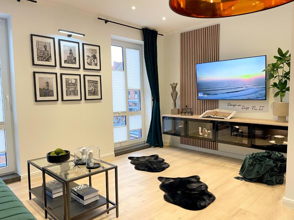 TV a/nebo společenská místnost v ubytování Ferienwohnung Domizil am Delft II Emden