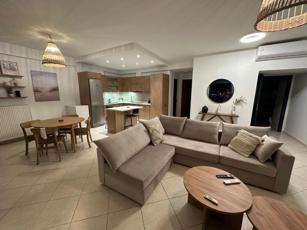 Posezení v ubytování Frosini Seafront Loft