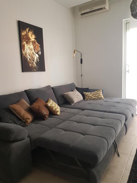 Posteľ alebo postele v izbe v ubytovaní le J&J Appartement spacieux climatisé en centre ville