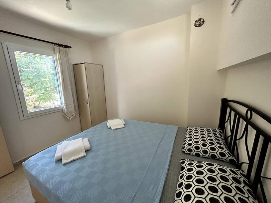 Postel nebo postele na pokoji v ubytování Somos Flats - Yalıkavak