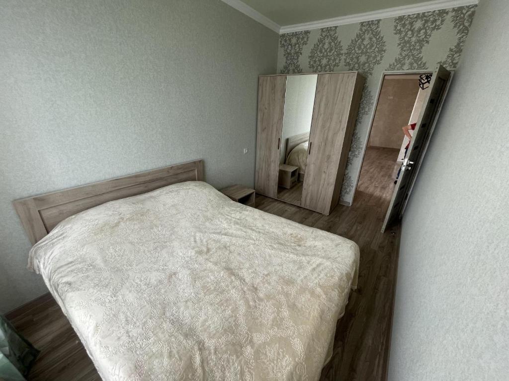 Postel nebo postele na pokoji v ubytování Armani Guest house