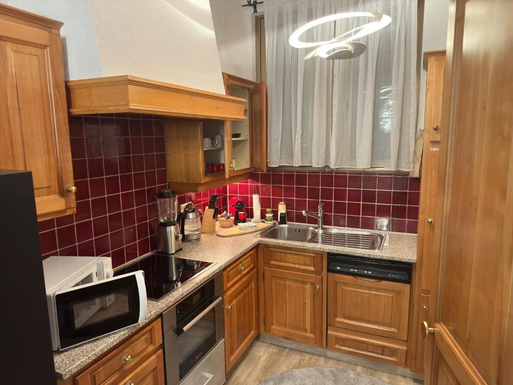 Kuchyň nebo kuchyňský kout v ubytování Villa Montreux
