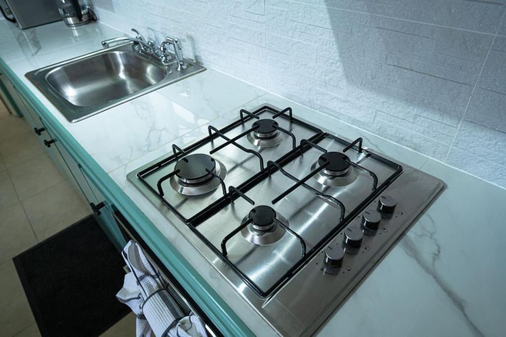 A kitchen or kitchenette at SOHI Villa