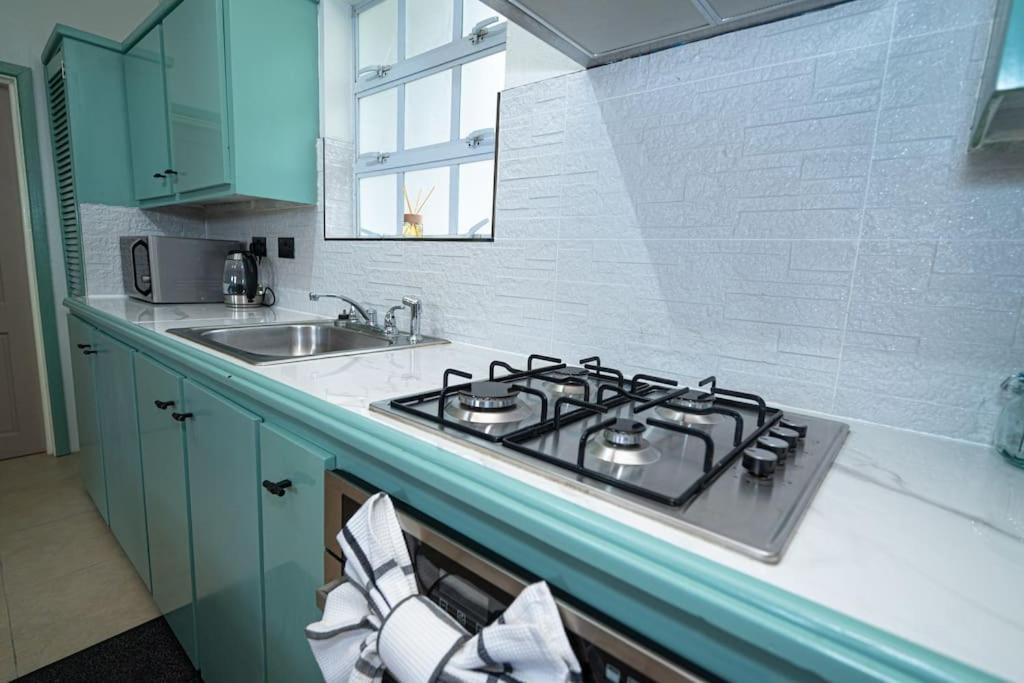 A kitchen or kitchenette at SOHI Villa