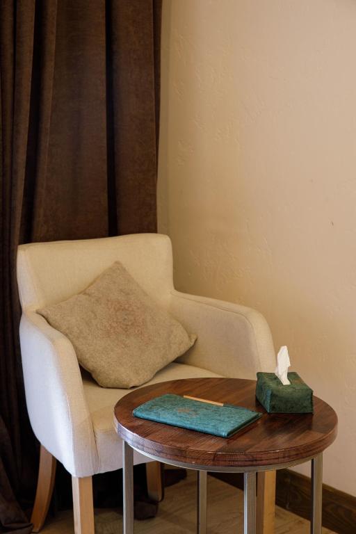 Posezení v ubytování Boutique ETHNO HOTEL