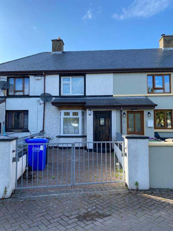 a house with a gate in front of it at Sligo town House in Sligo