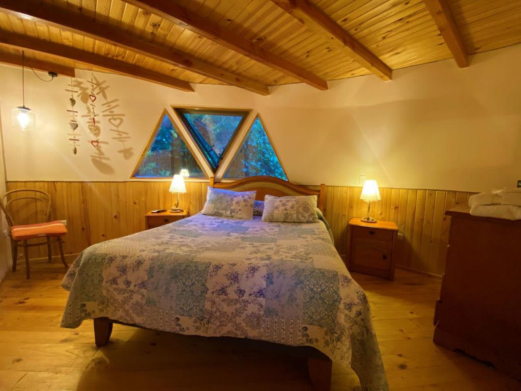 Postel nebo postele na pokoji v ubytování Domo La Luz