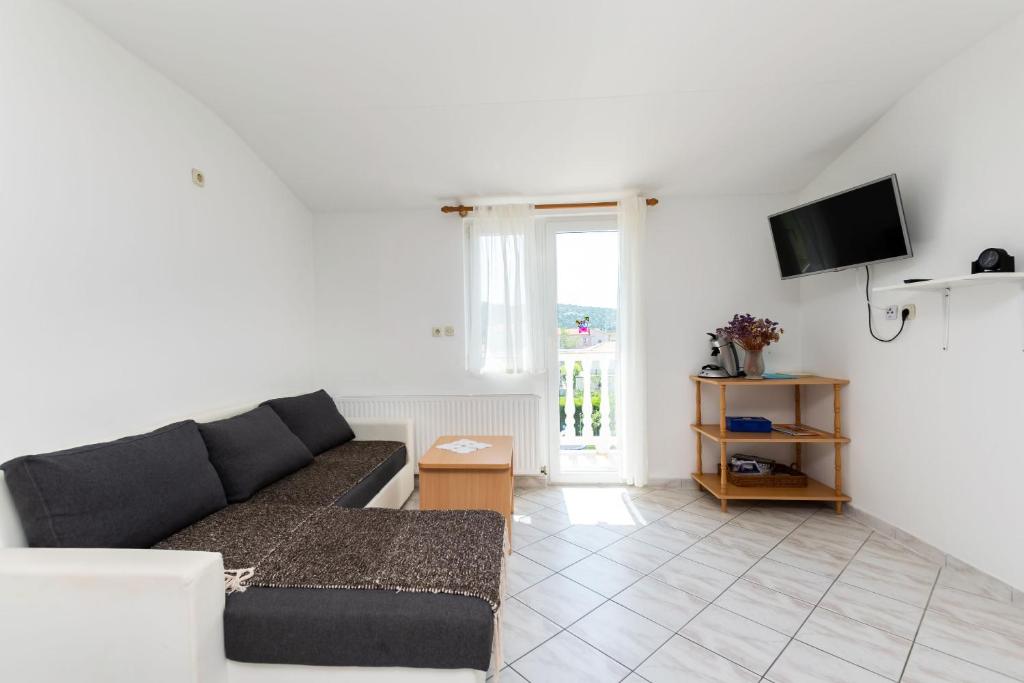 TV a/nebo společenská místnost v ubytování Apartments Boza