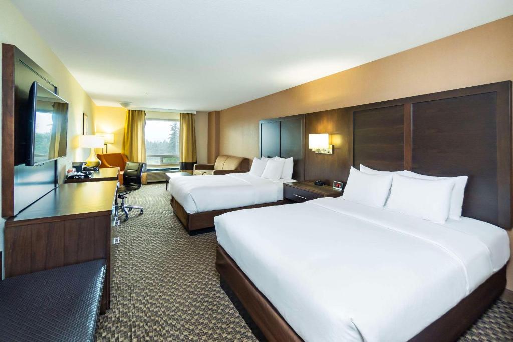 Postel nebo postele na pokoji v ubytování Comfort Inn & Suites