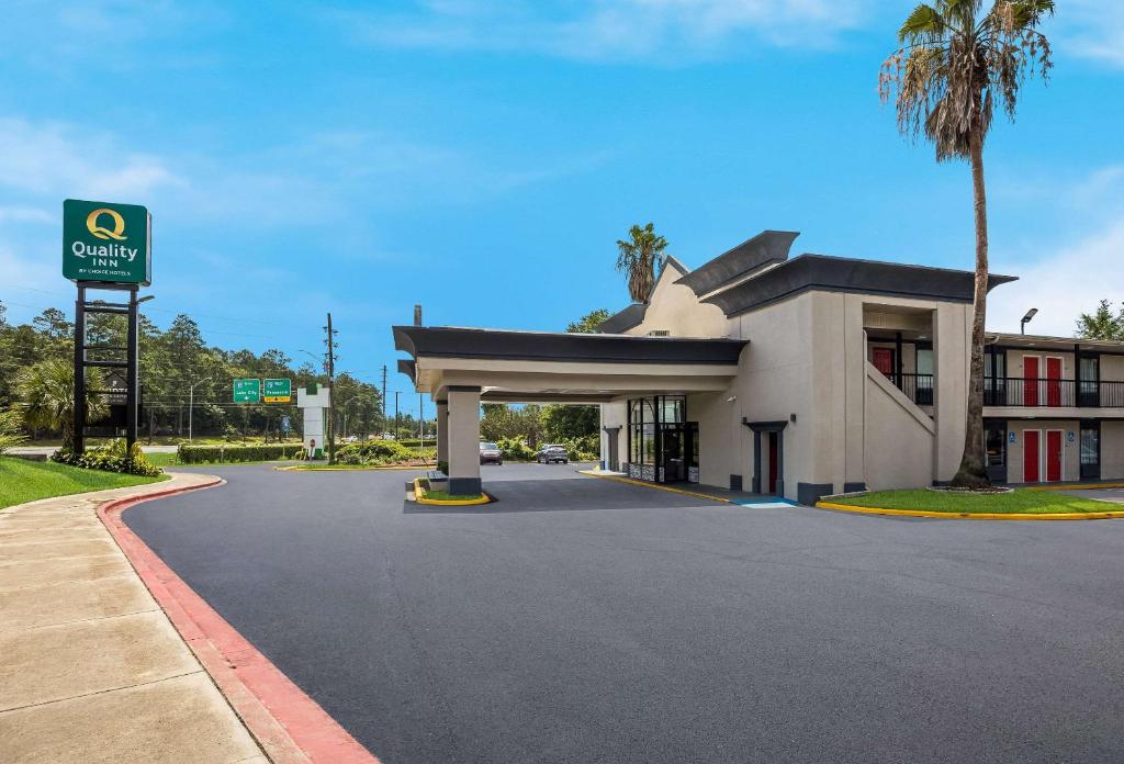 a view of a hotel with a gas station at Quality Inn Tallahassee near University in Tallahassee