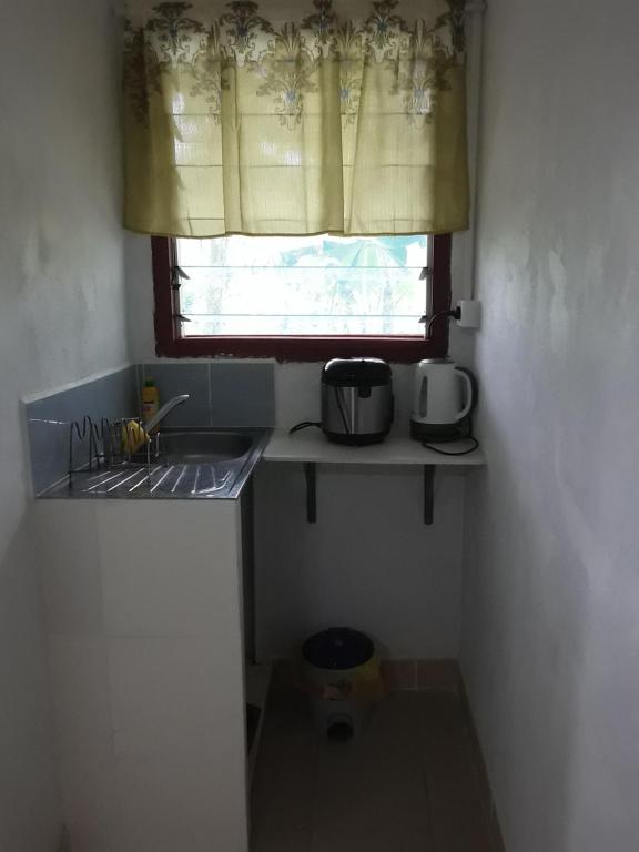 Kuchyň nebo kuchyňský kout v ubytování Kathy B Guesthouse