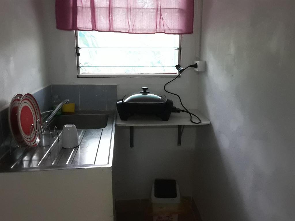 Kuchyň nebo kuchyňský kout v ubytování Kathy B Guesthouse