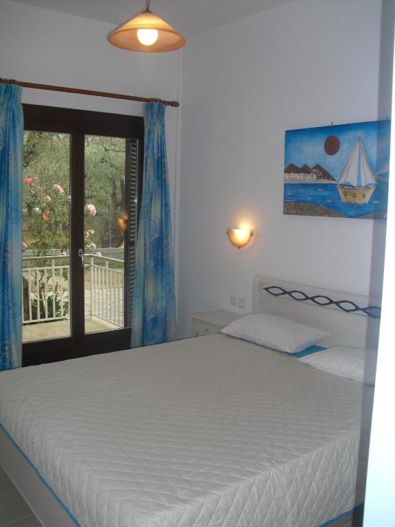 Posteľ alebo postele v izbe v ubytovaní Guesthouse Irene