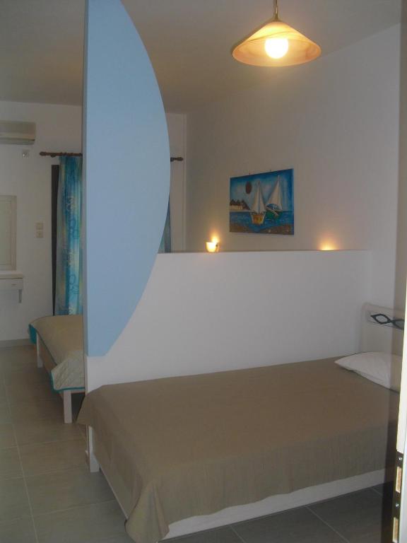 Posteľ alebo postele v izbe v ubytovaní Guesthouse Irene