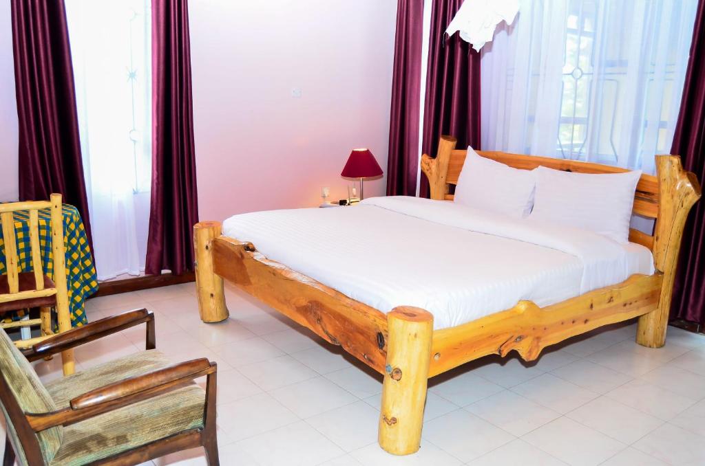 Postel nebo postele na pokoji v ubytování Merinja Guest House