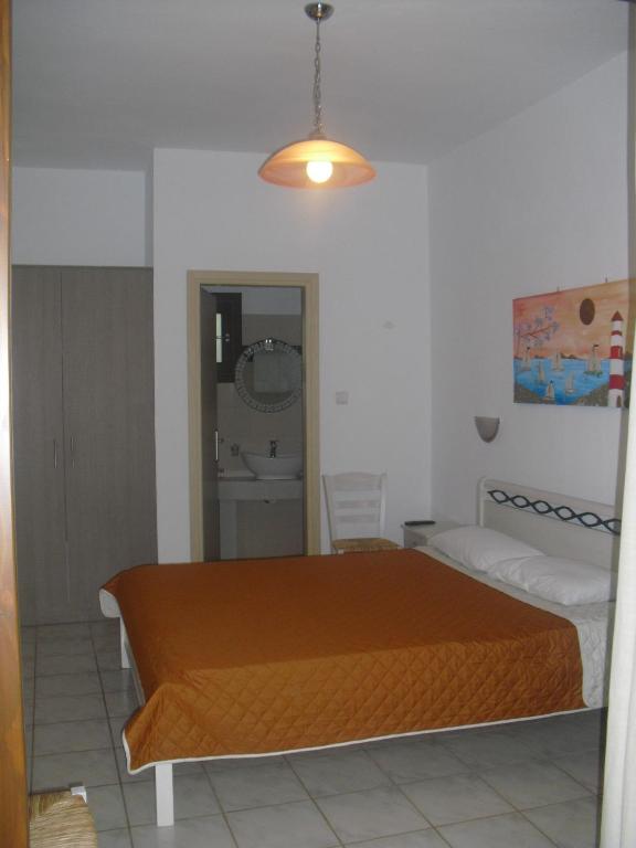 Posteľ alebo postele v izbe v ubytovaní Guesthouse Irene