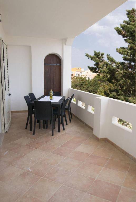 Uma varanda ou terraço em Villa Dacla