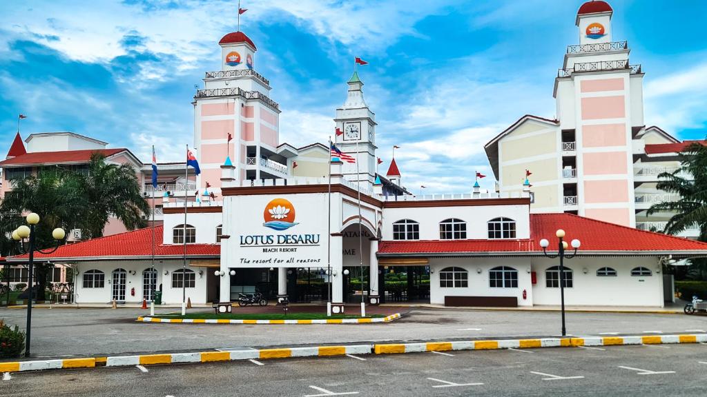 a building with two towers on top of it at Lotus Desaru Beach Resort & Spa in Desaru