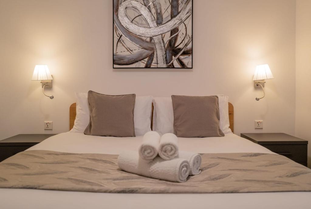 Postel nebo postele na pokoji v ubytování Portside Lodge