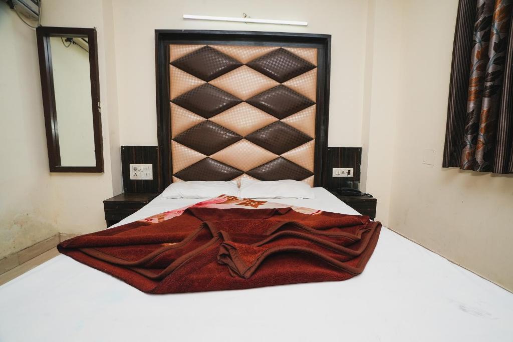 Postel nebo postele na pokoji v ubytování Hotel AV International Near New Delhi Railway Station, Paharganj