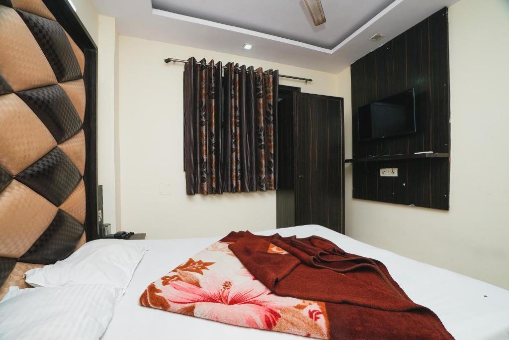 Postel nebo postele na pokoji v ubytování Hotel AV International Near New Delhi Railway Station, Paharganj