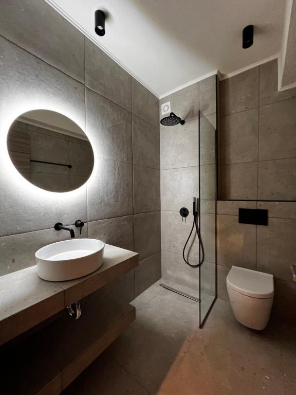 Koupelna v ubytování La Boheme Suites