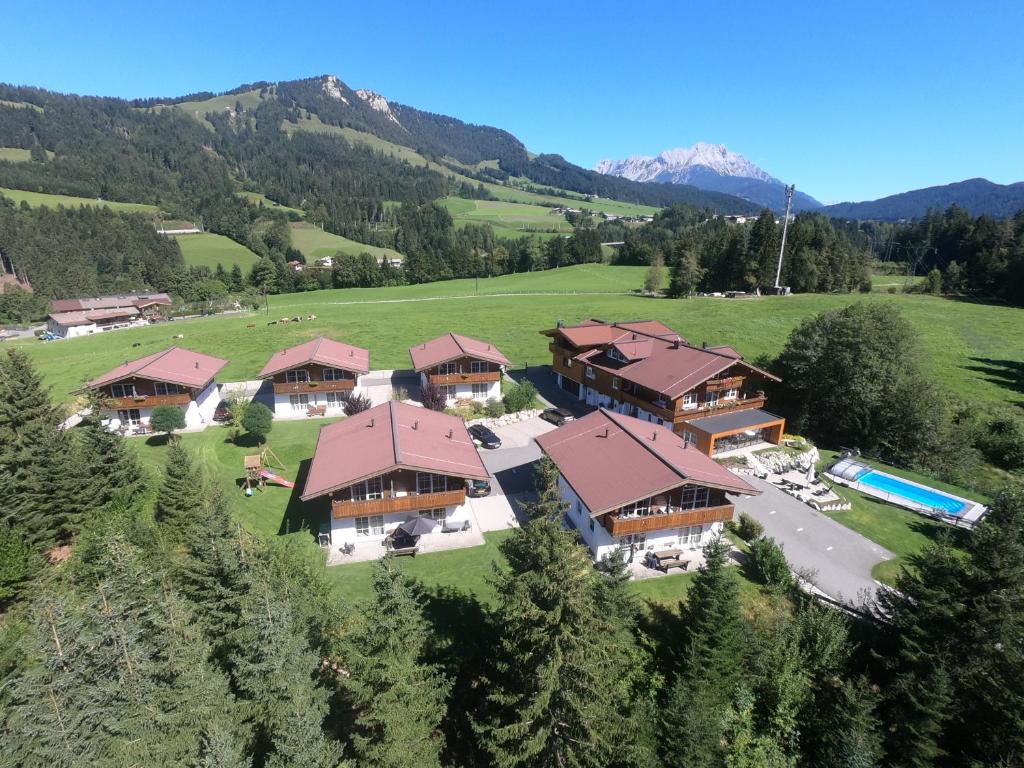 an aerial view of a resort in the mountains at Feriendorf Wallenburg in Fieberbrunn
