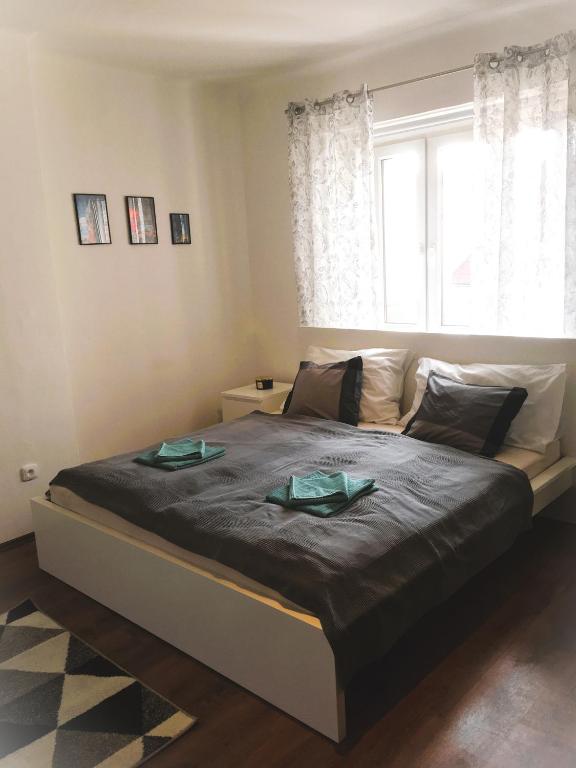 Postel nebo postele na pokoji v ubytování City Center Apartments - Moderna Brno Římské náměstí V