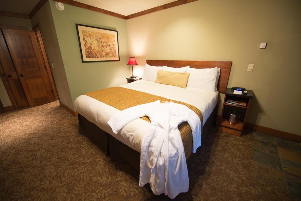 Postel nebo postele na pokoji v ubytování Avalon Lodge South Lake Tahoe