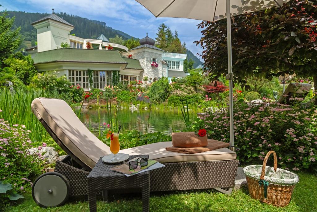 Vonkajšia záhrada v ubytovaní Salzburgerhof, das 5-Sterne Hotel von Zell am See