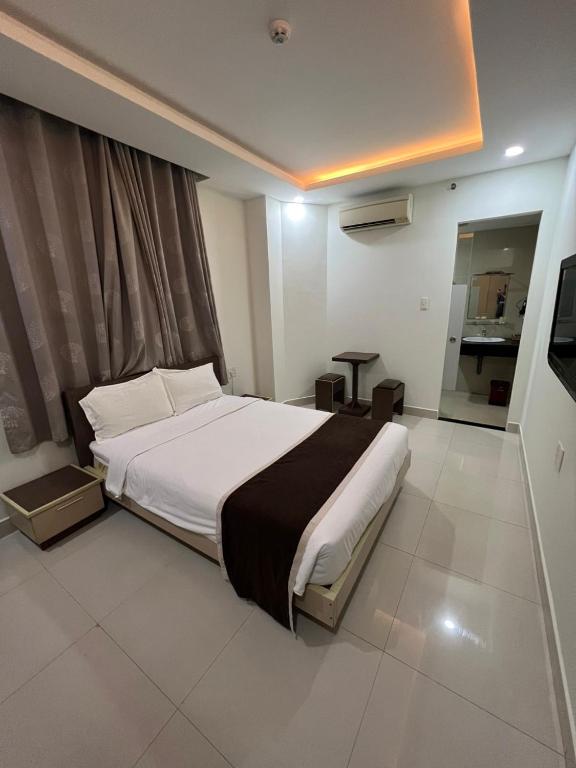Postel nebo postele na pokoji v ubytování Princess Hotel