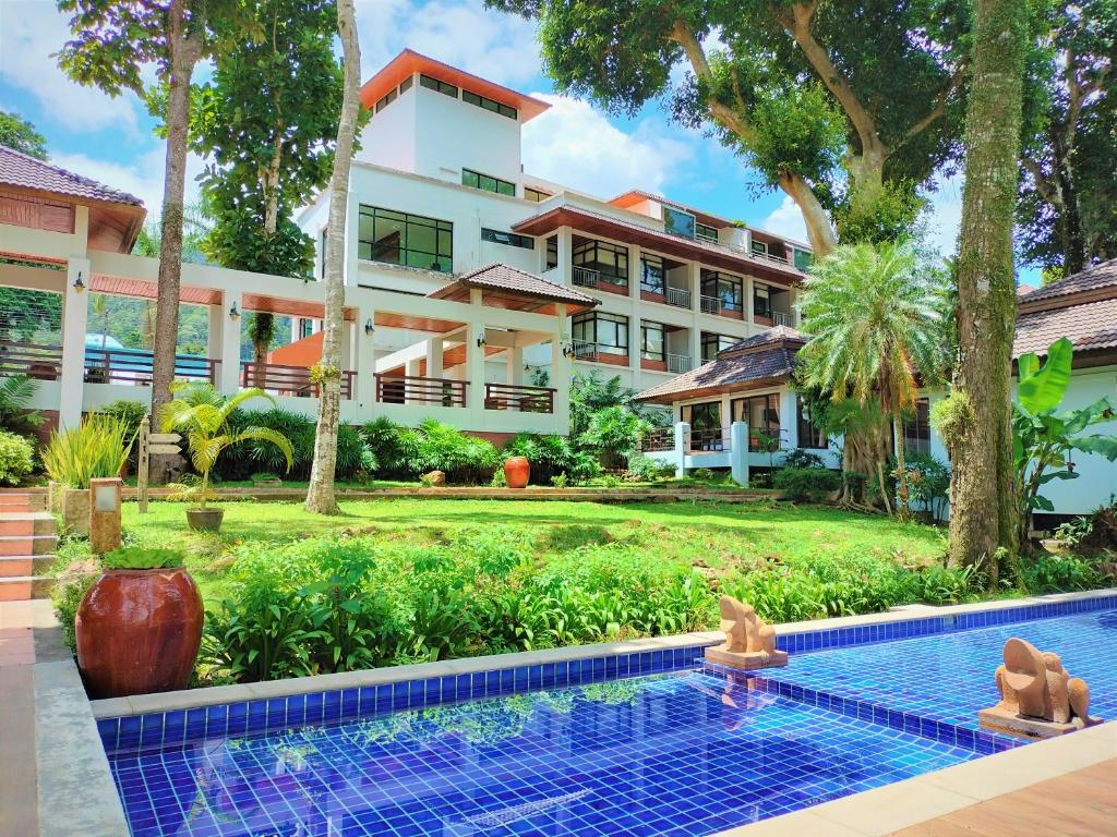 an exterior view of a resort with a swimming pool at Chang Buri Resort & Koh Chang Hillside in Ko Chang