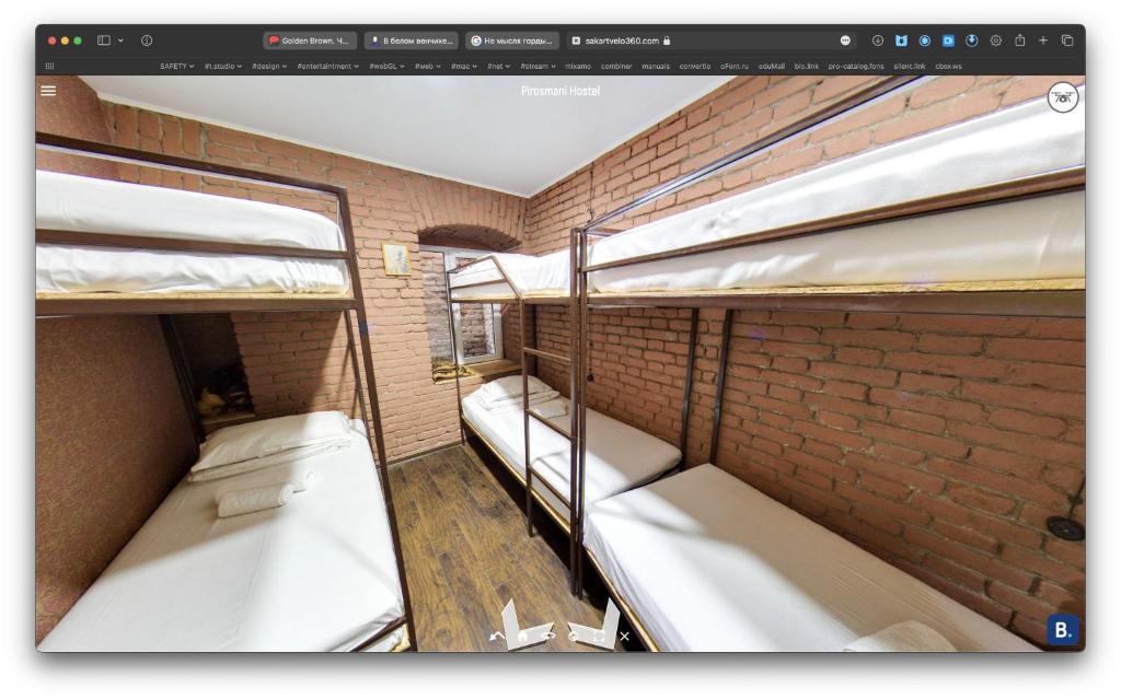 Postel nebo postele na pokoji v ubytování Hostel Pirosmani