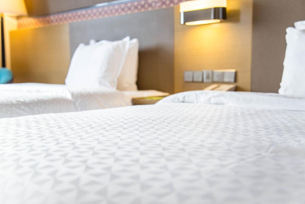 Four Points By Sheraton Guilin Lingui客房内的一张或多张床位