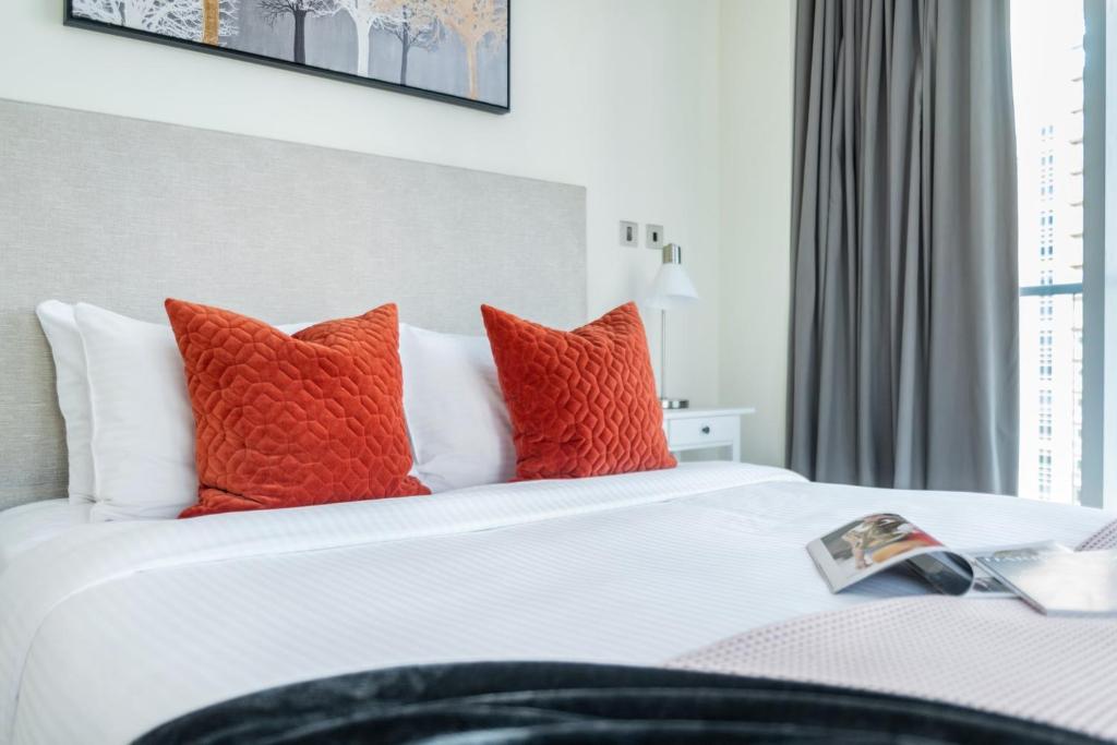 Postel nebo postele na pokoji v ubytování The Smart Concierge - Marinascape Oceanic