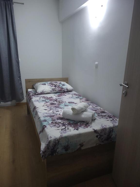 Postel nebo postele na pokoji v ubytování Apartmani Škorpion