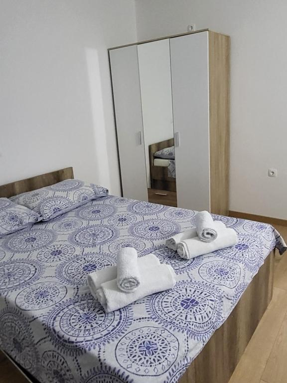 Postel nebo postele na pokoji v ubytování Apartmani Škorpion