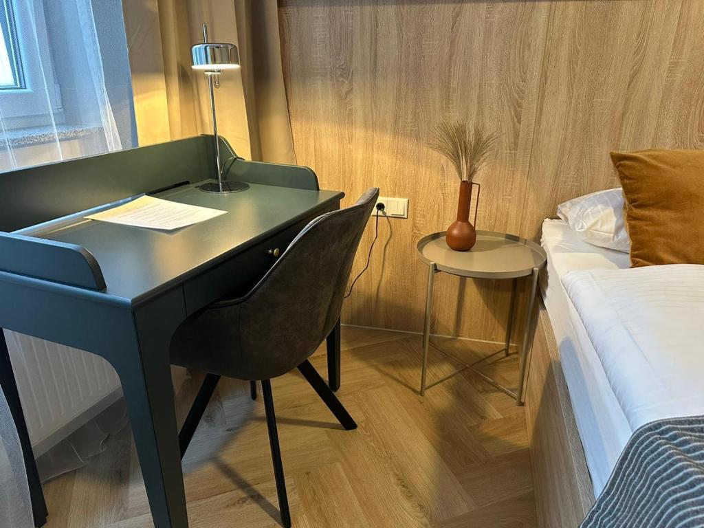 Postel nebo postele na pokoji v ubytování Aparthotel Lenau