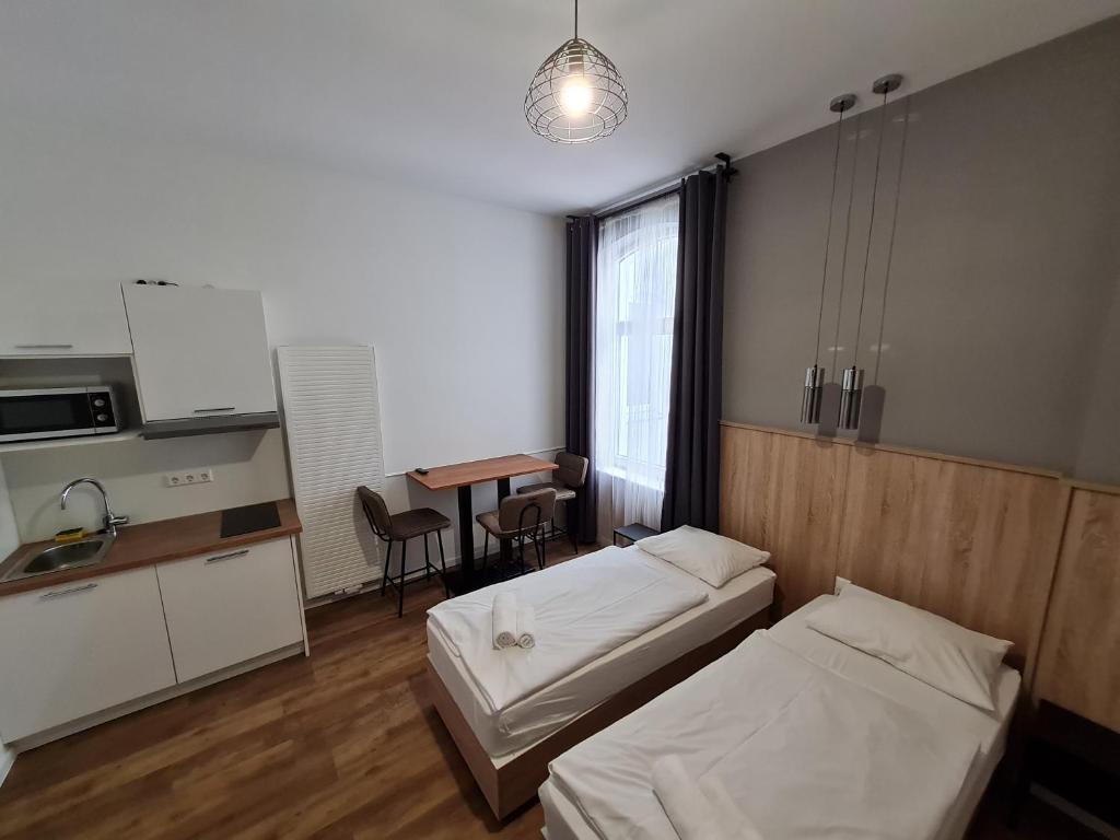 Aparthotel Lenau - Resim 4