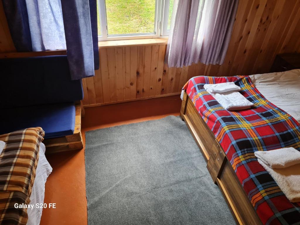 Postel nebo postele na pokoji v ubytování LIO