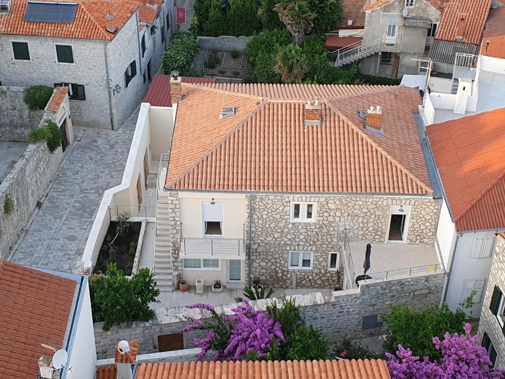 an aerial view of a building with red roofs at Apartment NINA in Rab