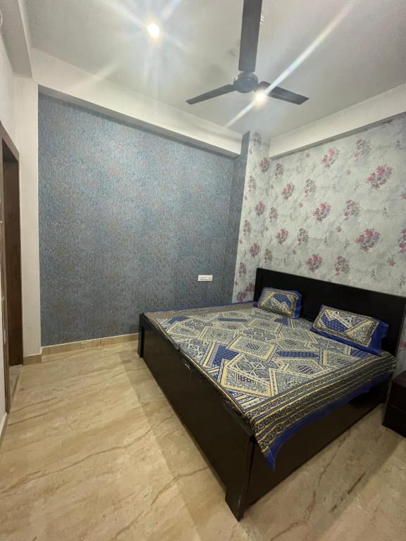 Postel nebo postele na pokoji v ubytování Prabhu Sadan home stay
