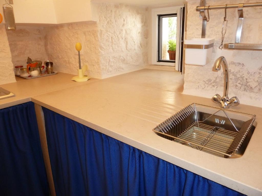 Kjøkken eller kjøkkenkrok på Il Piccolo Trullo