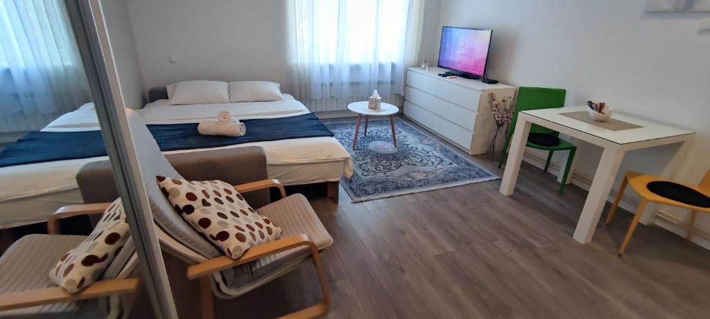 Telewizja i/lub zestaw kina domowego w obiekcie Cibona