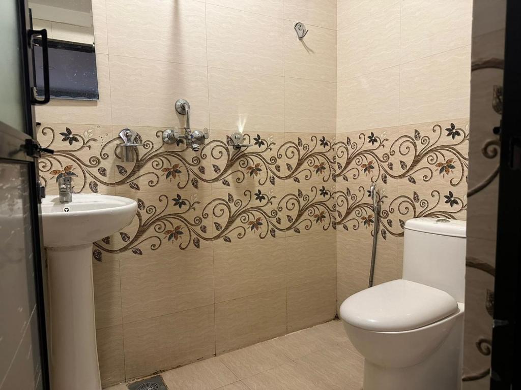 Koupelna v ubytování HOTEL PARAMI INN