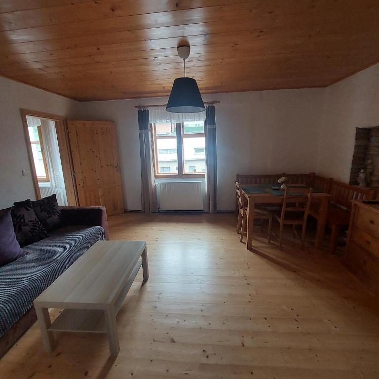Posezení v ubytování Apartmány U Tří Sluncí